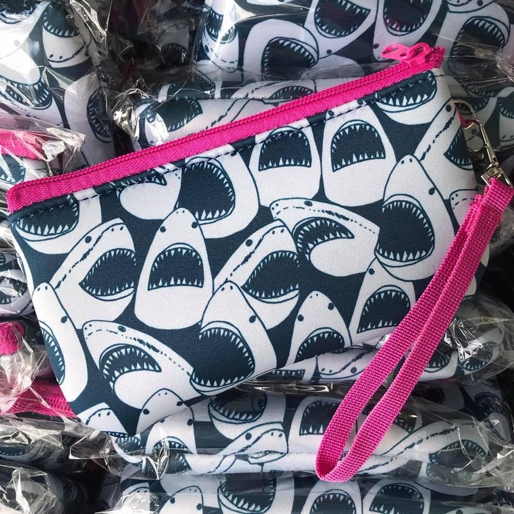 Two Shark cosmetic/tampon bags